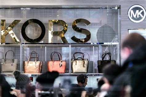 michael kors investments|who owns capri holdings.